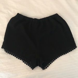 Black Brandy Melville shorts with lace trim